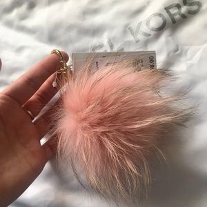 Michael Kors pink Pom Pom